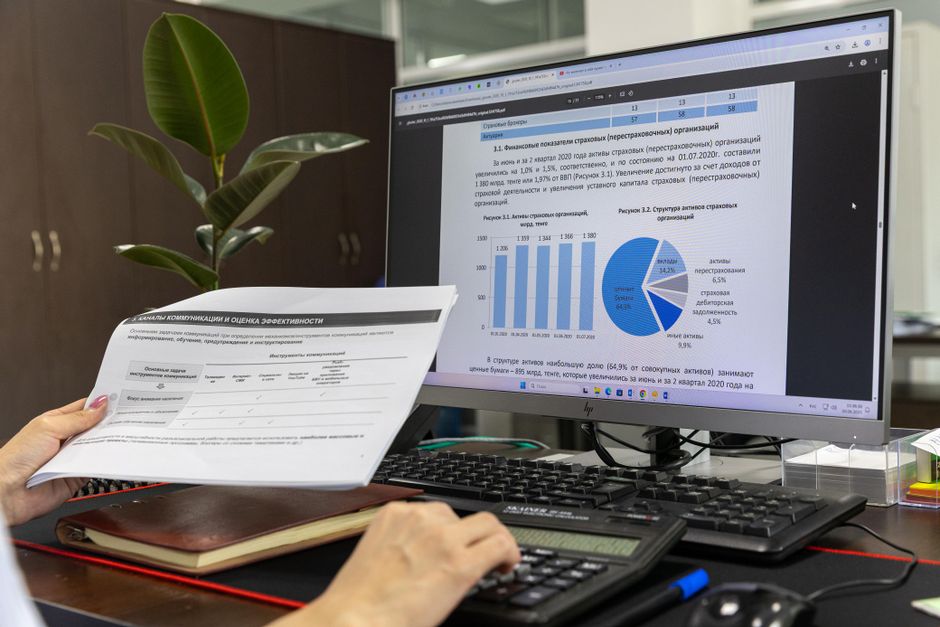 Finance operations and sales managers reviewing weekly performance reports together in a calm modern office meeting
